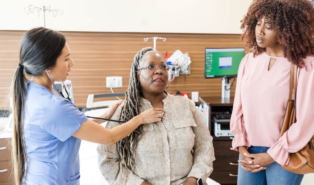 Woman being examined in Emergency Room