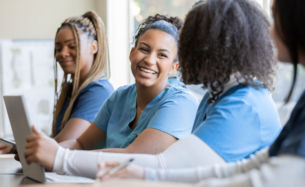 Medical students working on medical documents