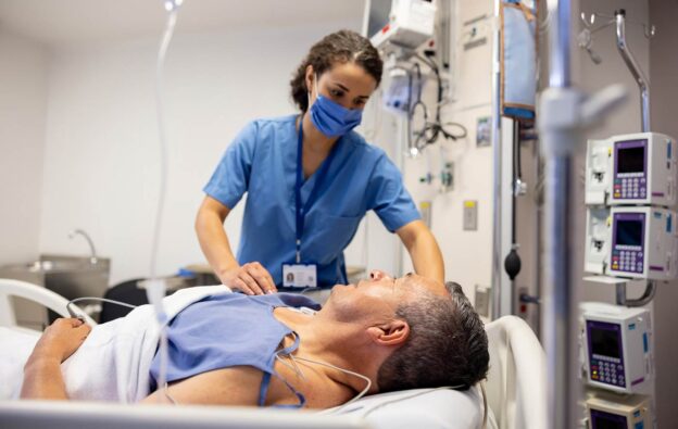 Nurse examining patient in Emergency Room